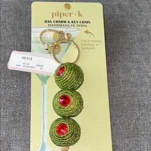 Piper K Green Bag Charm with Red Accents